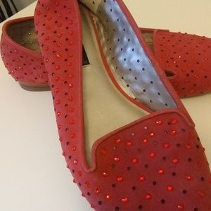 Steve Madden red shoe leather upper.